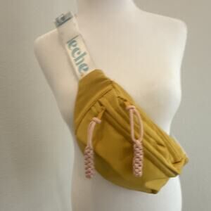 Leche Mustard Yellow Fanny Pack Crossbody Bag White Strap Zipper Crescent Solid